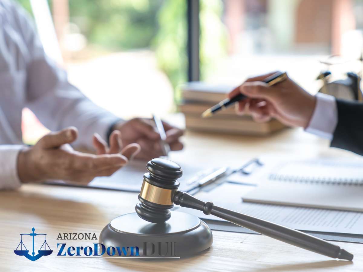 Client consulting with an attorney about a DUI case at Arizona Zero Down DUI